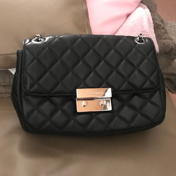 Michael Kors Handbags - Michael Kor’s flip bag